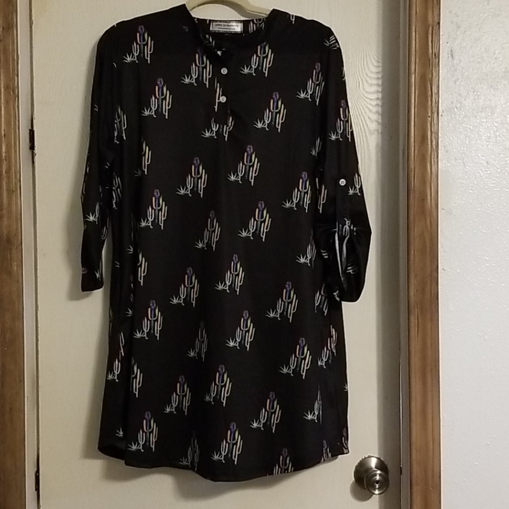 Polyester black top with cactus print.